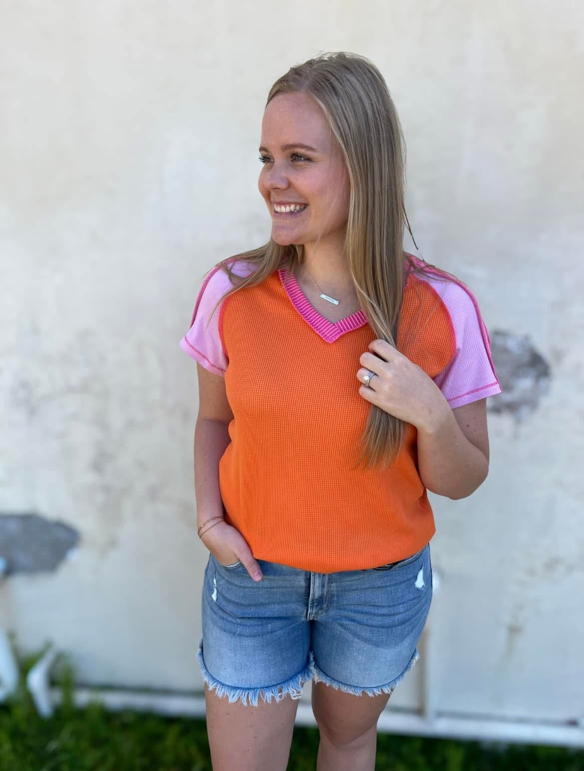 Orange Exposed Seam Top